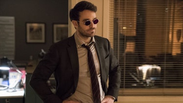 Charlie Cox's Matt Murdock stands in an office in Daredevil Season 1