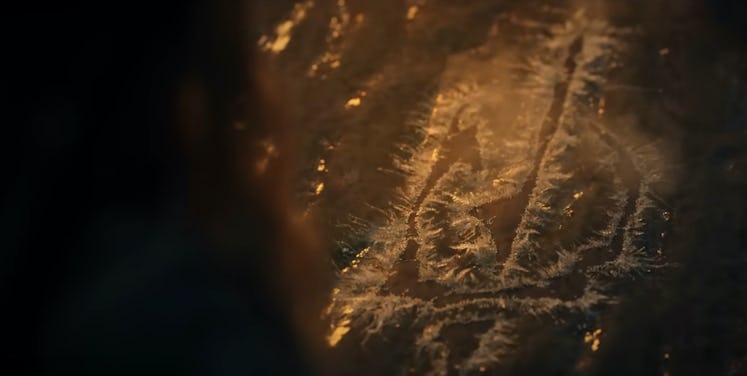 Galadriel looks down at Sauron's mark in The Lord of the Rings: The Rings of Power
