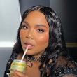 Lizzo long hair sipping le croix