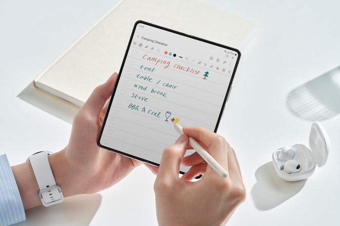 The Galaxy Z Fold 4 in tablet mode with a stylus.