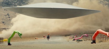 A flying saucer lands in in a field in ‘Nope.’ 