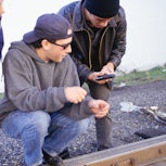 Three teens look at a gun near a railroad track. The CDC just released a new study showing how often...