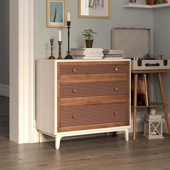 This decorative dresser for small spaces features three rattan-accented drawers.