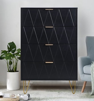 This modern dresser for small spaces has four drawers with metal accents.
