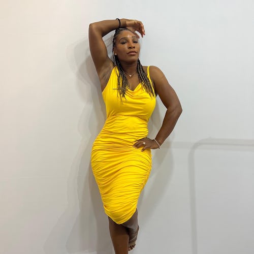 Serena Williams wears a yellow S by Serena dress.