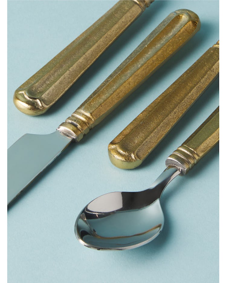 This gold flatware is one of the fall 2022 home decor trends, according to experts. 