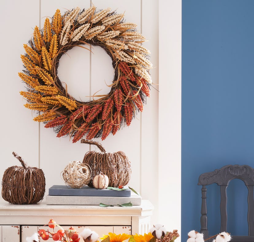Experts reveal fall 2022 home decor trends that include ombre wreaths.