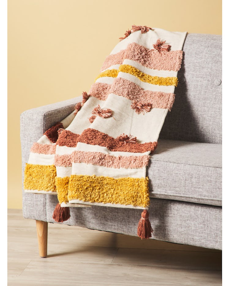 This throw is one of the fall 2022 home decor trends, according to experts. 