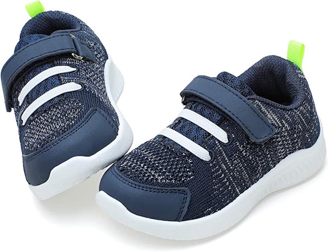 These sturdy kids sneakers slip on and secure with a Velcro strap near the ankles.