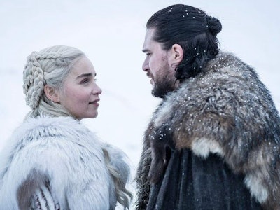 Daenerys Targaryen and Jon Snow looking at each other lovingly.