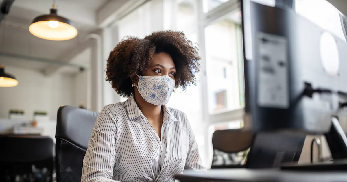 Masked Workers Being the only one masked in the office can be hard. A psychiatrist ...