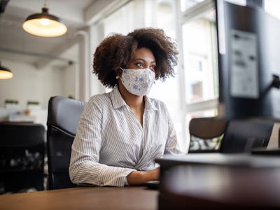 People who are still masking at work well after mask mandates dropped can feel caught between being ...