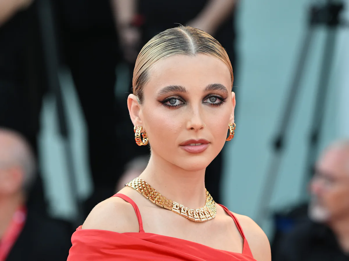 emma chamberlain red dress venice Emma Chamberlain's Venice Film Festival Diary: Cartier, Canals, and 24 Karat Gold