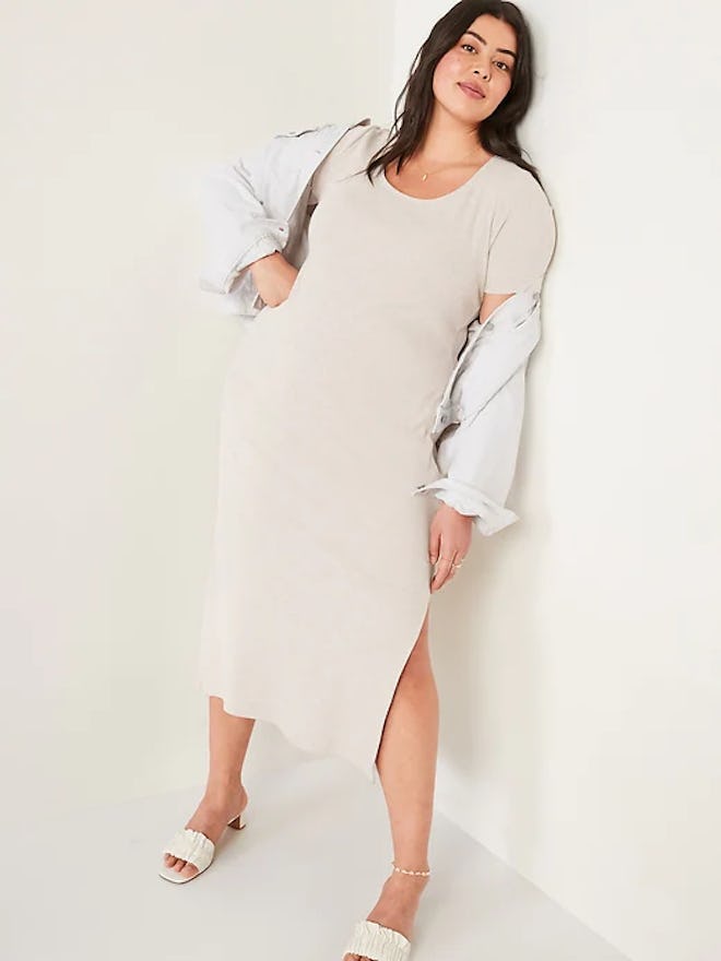 Plus-sized woman wearing a cream colored short sleeved rib knit midi dress in an article about old n...
