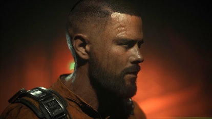 A side profile of Jacob, the protagonist of The Callisto Protocol. He is wearing an orange jumpsuit.