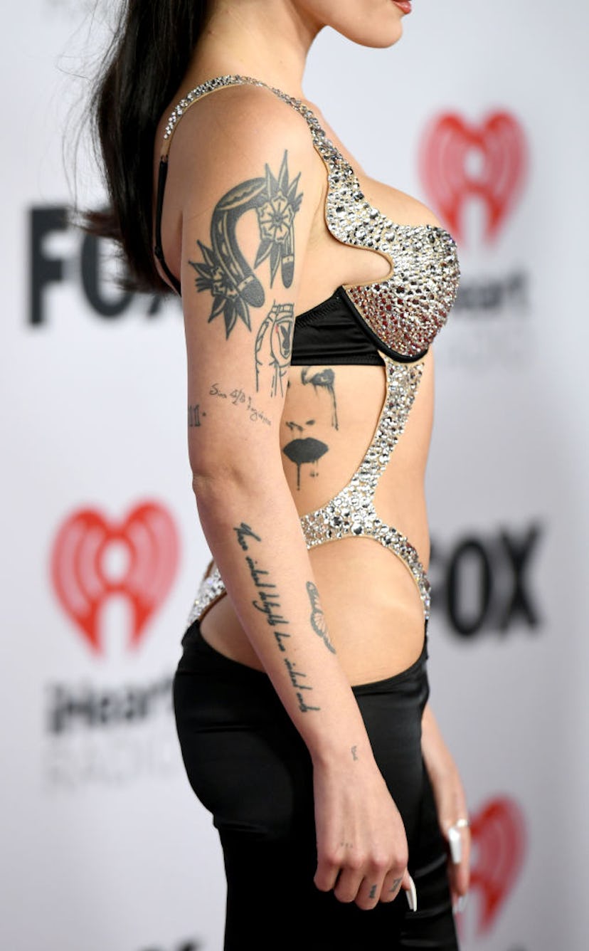 Halsey has a portrait of Marilyn Manson tattooed on their ribs.