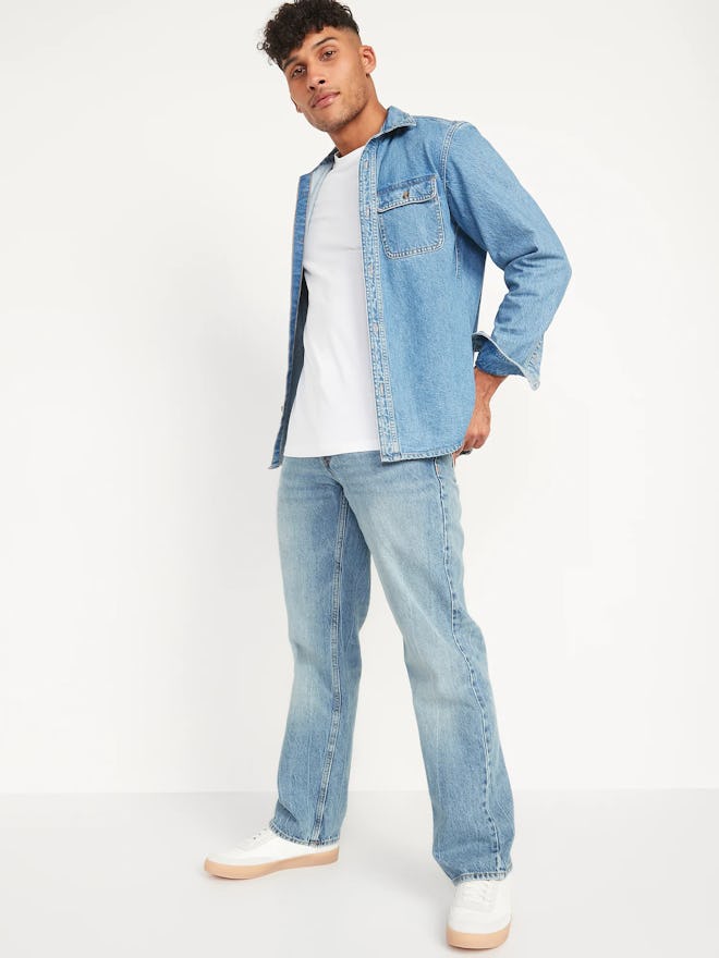 A man wearing a white shirt, white sneakers, and a denim top and jeans in an article about old navy'...