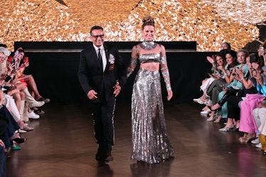 Naeem Khan and Kate Beckinsale walking the finale of Khan's NYFW show