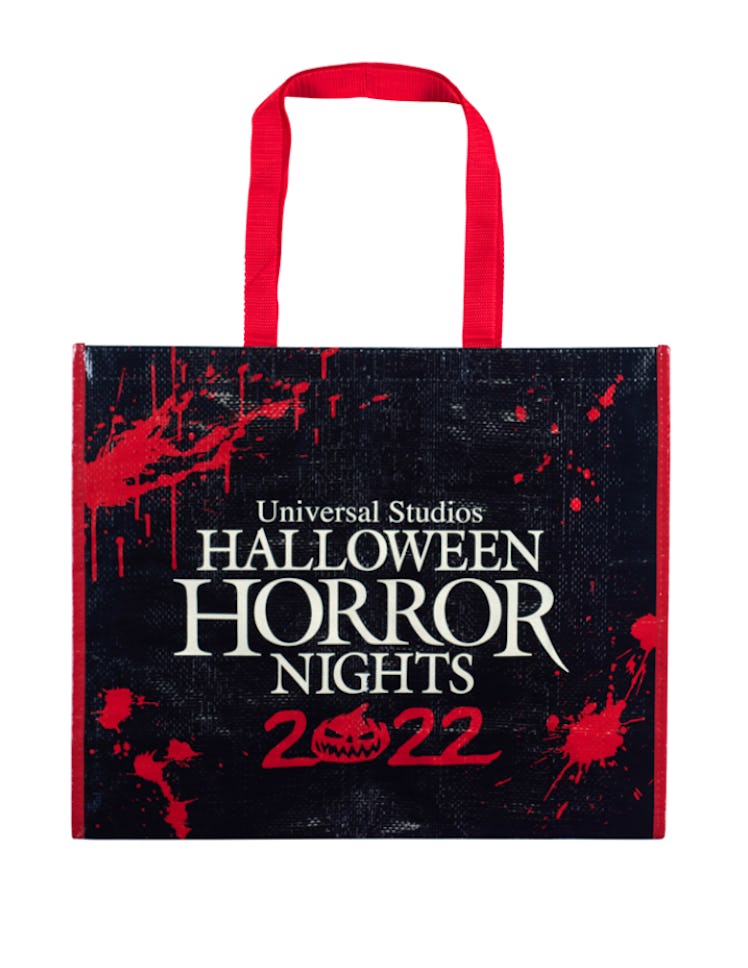 Universal Studios’ Halloween Horror Nights Merch Features the 'Never Go Alone' Reusable Tote Bag For...