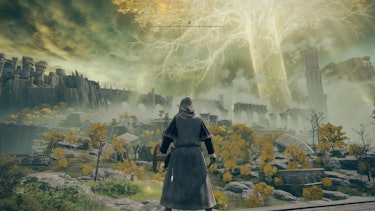 A screenshot from Elden Ring shows the towering Etrdree looming in the distance.