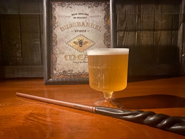 Halloween Horror Nights 2022 Death Eaters battle guests with wands and Hog's Head Inn has mead from ...