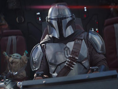 The Mandalorian and Grogu on a spaceship.