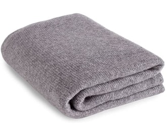 This 100% cashmere blanket is one of the best cashmere blankets for traveling.