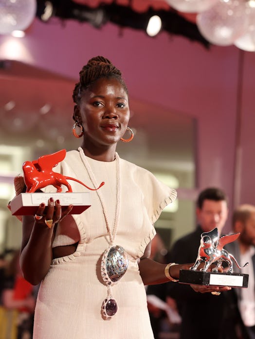 Alice Diop poses with the Lion of the Future – “Luigi De Laurentiis” Venice Award for a Debut Film f...