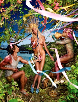 A David LaChapelle photo of a naked person wearing a halo in an idyllic setting