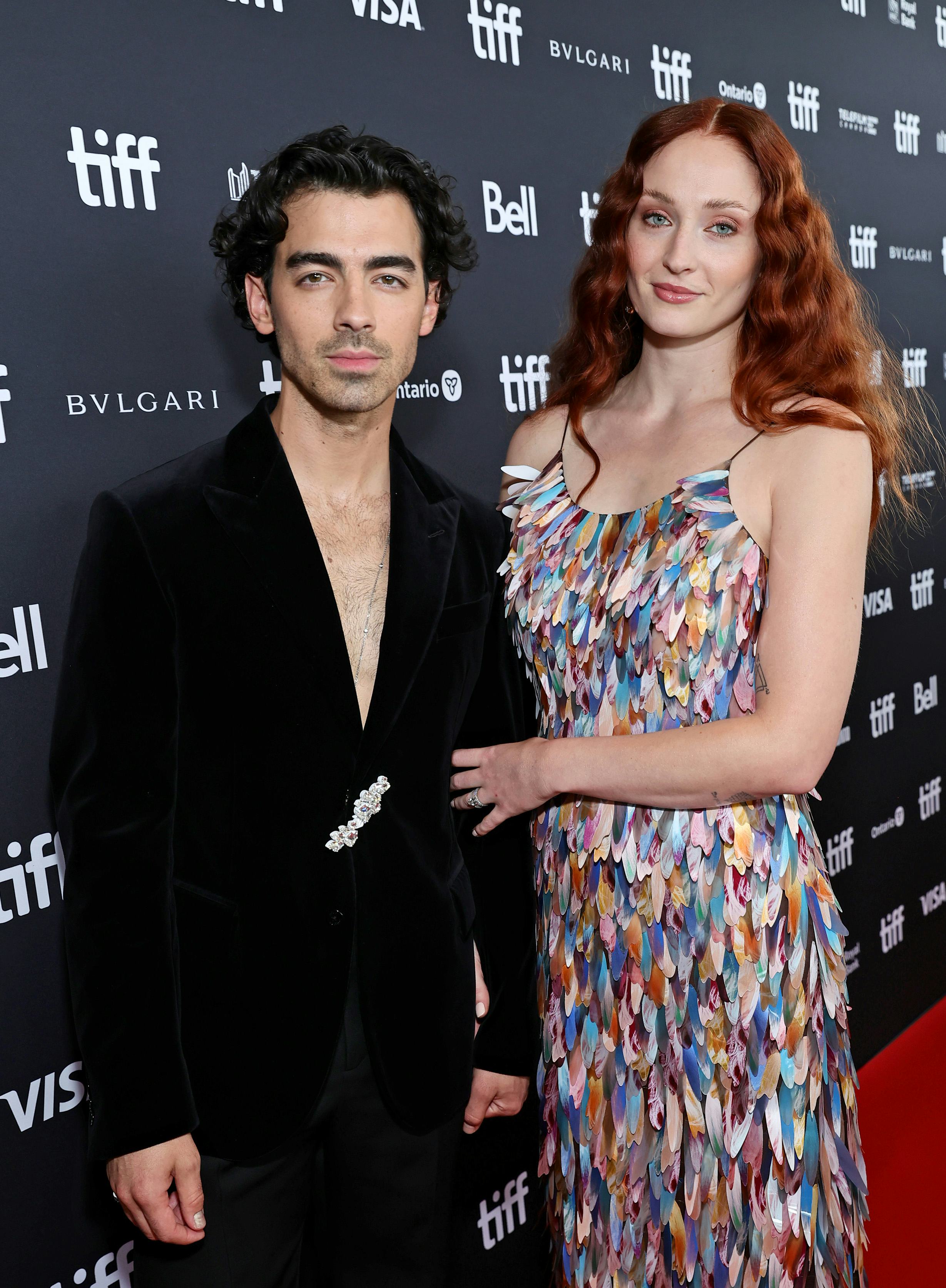 Joe Jonas and Sophie Turner attend the "Devotion" Premiere at Cinesphere on September 12, 2022