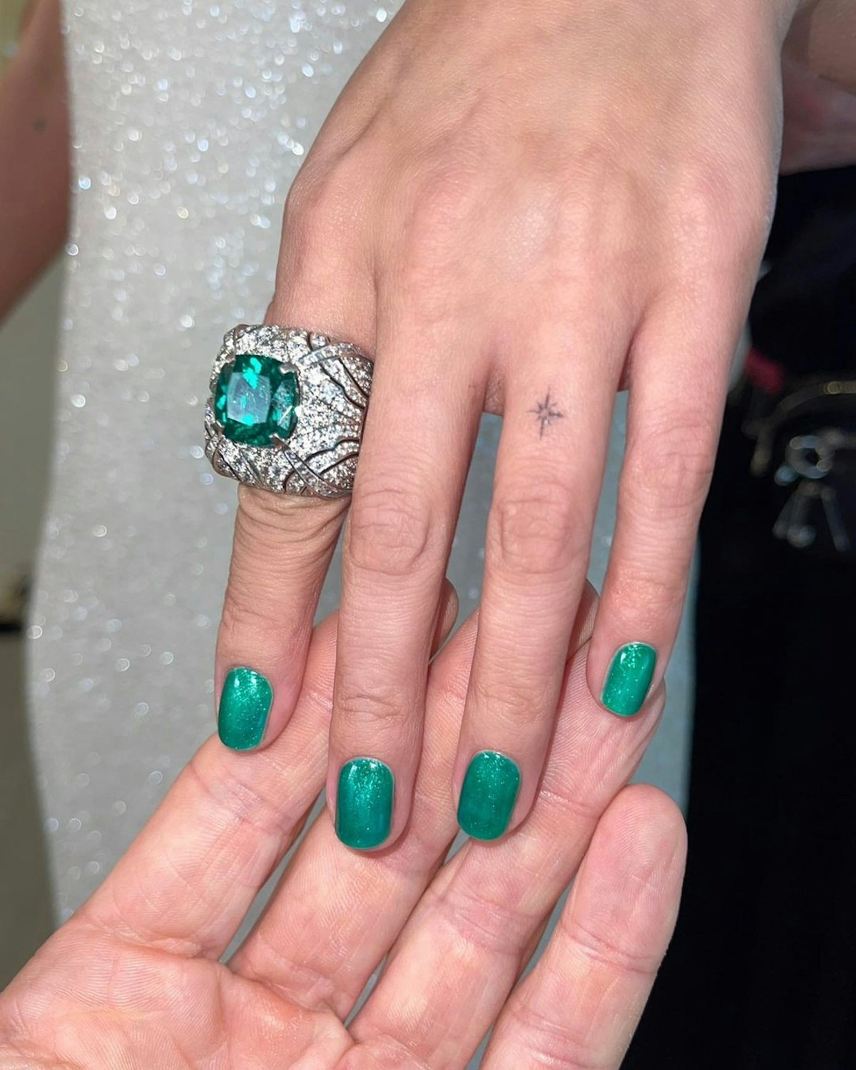 For the 2022 Emmys, manicurist Tom Bachik painted Selena Gomez's nails with a shimmery emerald green...