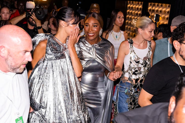 Bella Hadid, Serena Williams, and Gigi Hadid at the Vogue World fashion show during New York Fashion...