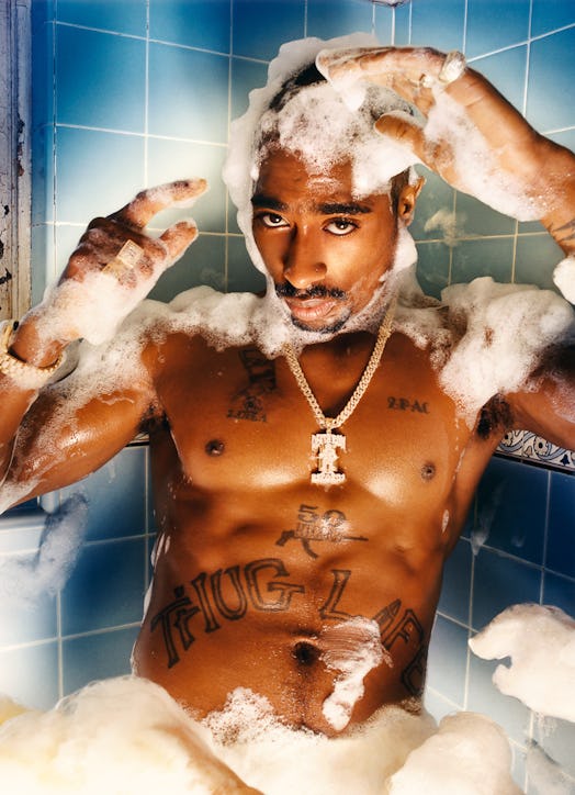 A David LaChapelle portrait of Tupac taking a bubble bath