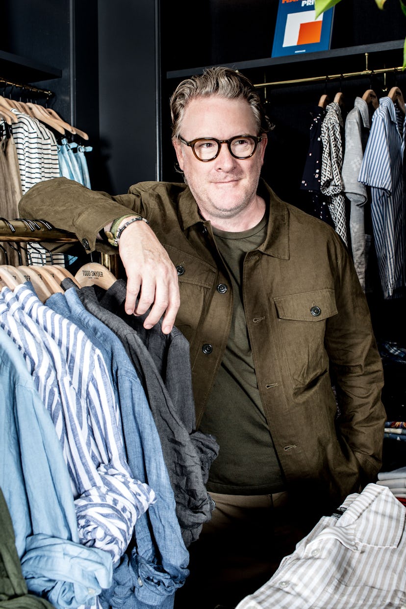 Todd Snyder leaning on hangers featuring menswear products which emulate everything right with the d...