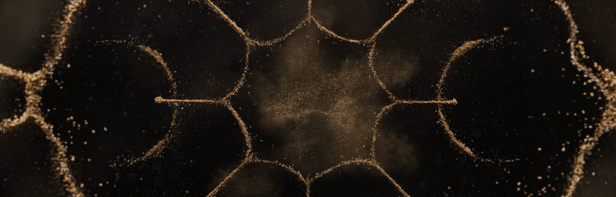 Sand formed into an. interesting pattern on the title credits of "The Rings of Power"