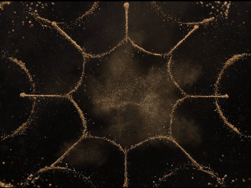 Sand formed into an. interesting pattern on the title credits of "The Rings of Power"