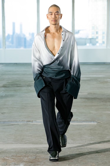 Peter Ash Lee baring his chest on the runway of Peter Do's spring 2023 NYFW show