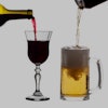 Wine and beer being poured into side by side glasses