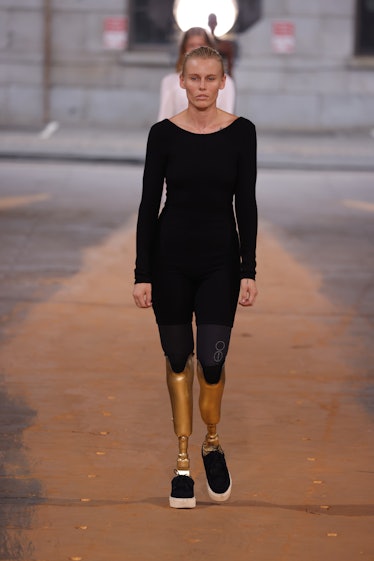 Lauren Wasser wearing black on the Gabriela Hearst spring 2023 NYFW runway