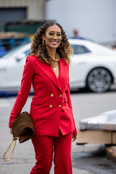 Elaine Welteroth wearing red outside Gabriela Hearst on September 13, 2022 in New York City.