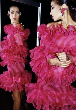 A model backstage at a Yves Saint Laurent spring 1993 haute couture show