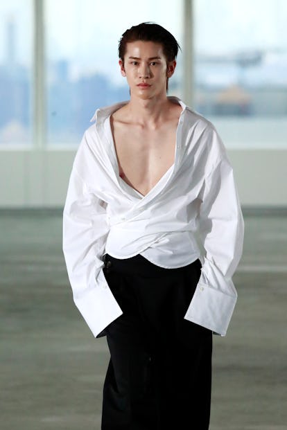 A bare-chested Shohei walking the spring 2023 Peter Do NYFW show
