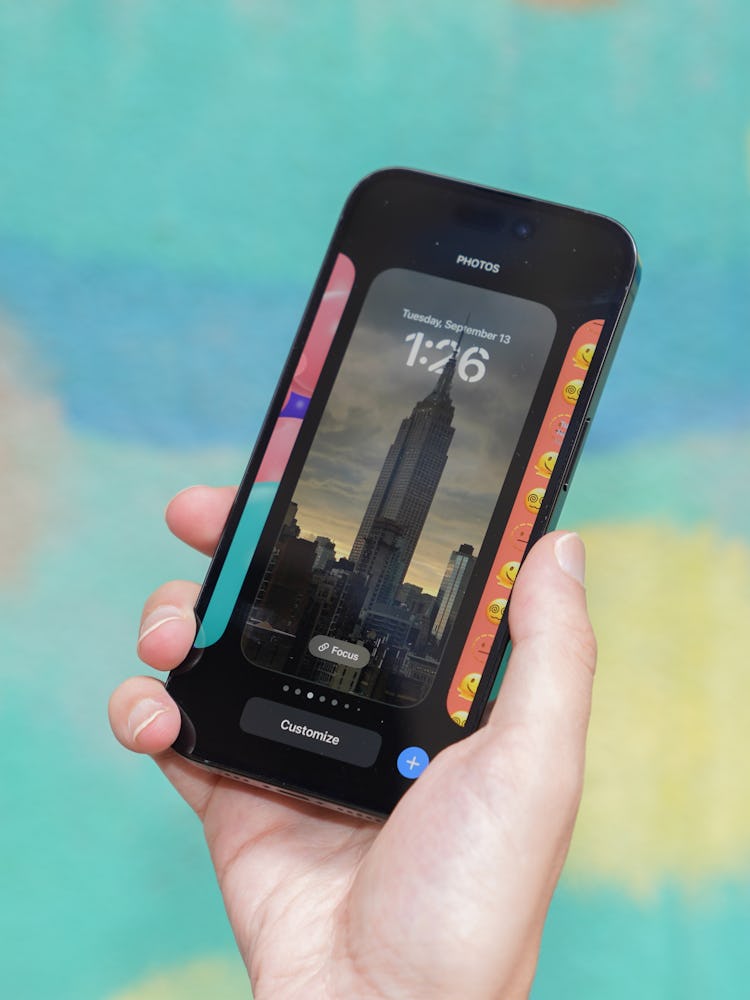 The iPhone 14 Pros’ always-on display will dim your lock screen — time, widgets, and calendar.