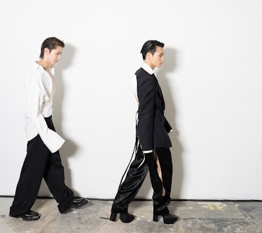Jeno and Shohei of SM Rookie walking to the runway
