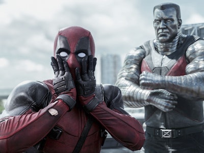 Deadpool with both hands on his face in a shocked expression from the movie Deadpool.