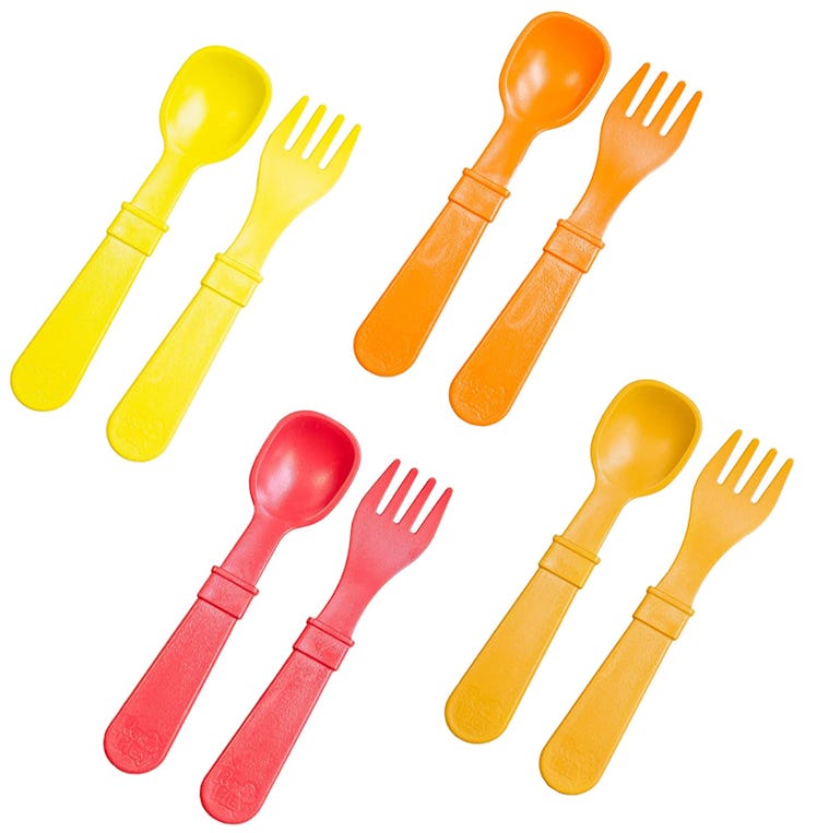 Yellow orange and red toddler forks and spoons