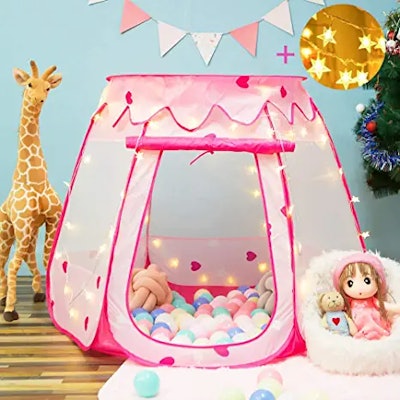 A pink princess pop up tent with fairy lights is the perfect gift for a 1-year-old to put in their r...