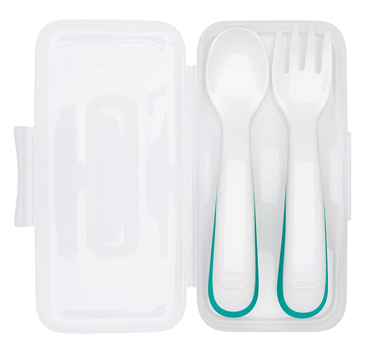 White and teal toddler fork and spoon in travel case