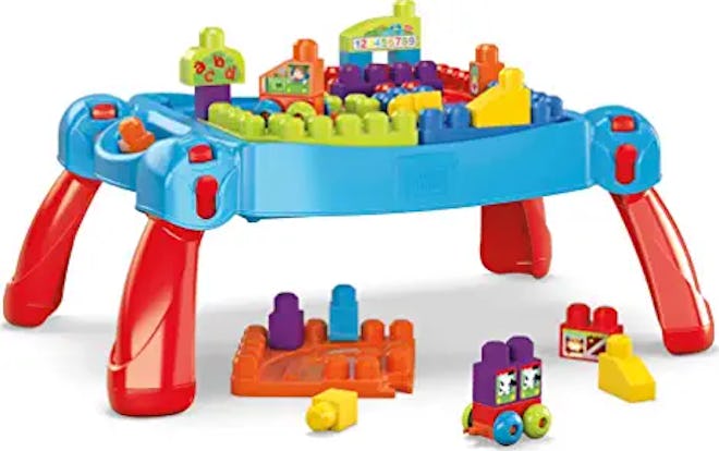 Building blocks are a great gift for 1-year-olds, and this table on legs has room to store them all.