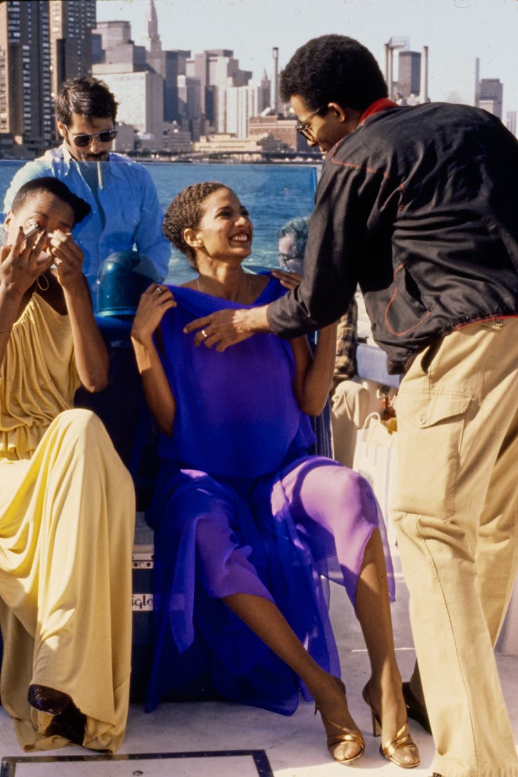 Stephen Burrows with models on a photo shoot.